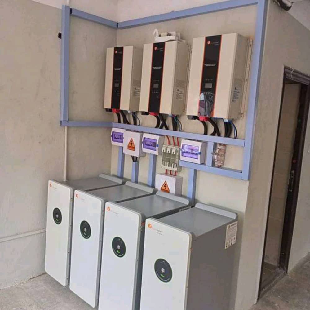 Three inverters and four batteries installed together for a larger power setup